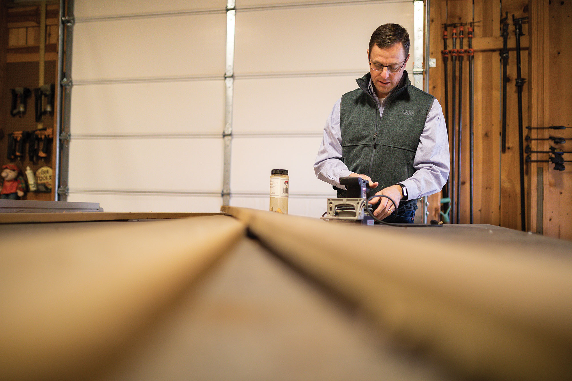 Steve Rhines works in his home workshop.