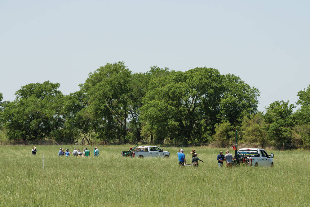 Researchers install and calibrate instruments on remote sensing flux towers.