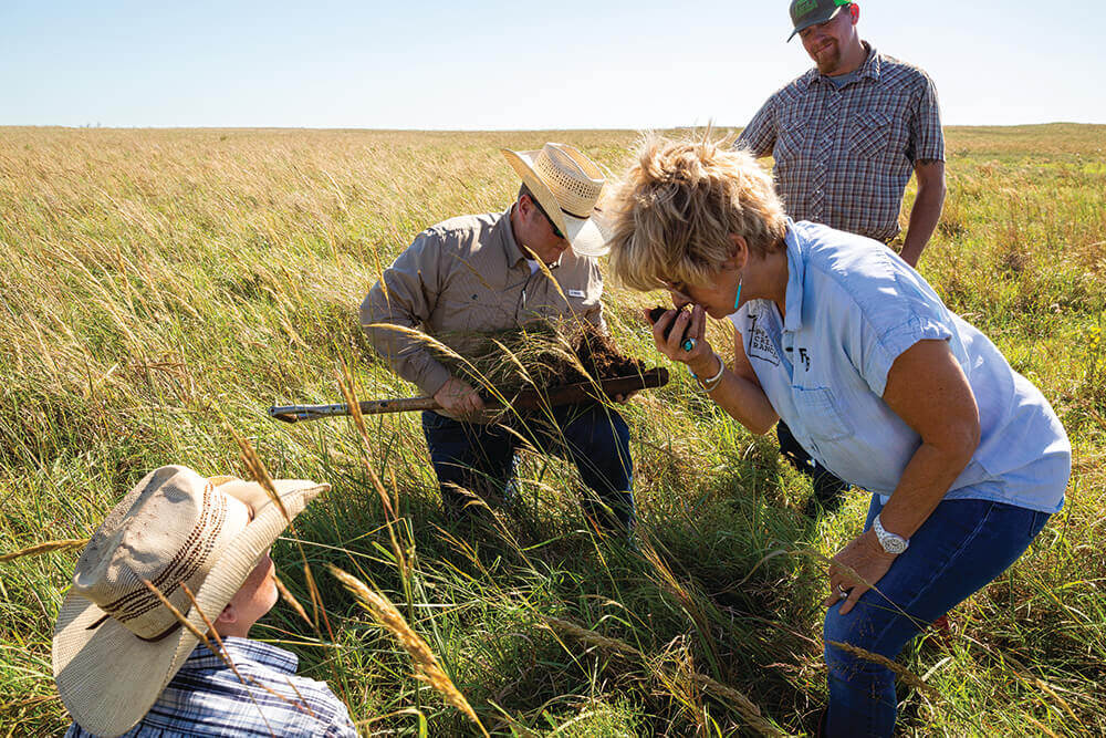 Susan Bergen and Jeff Goodwin inspect soil