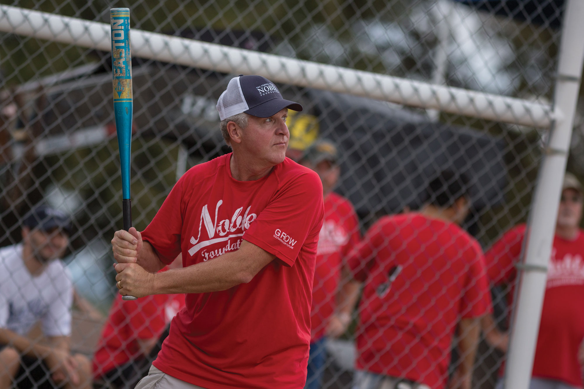 Bill Buckner plays softball as part of the Parkway Series, which brings together all employees for a day of fun and competition, in 2015.